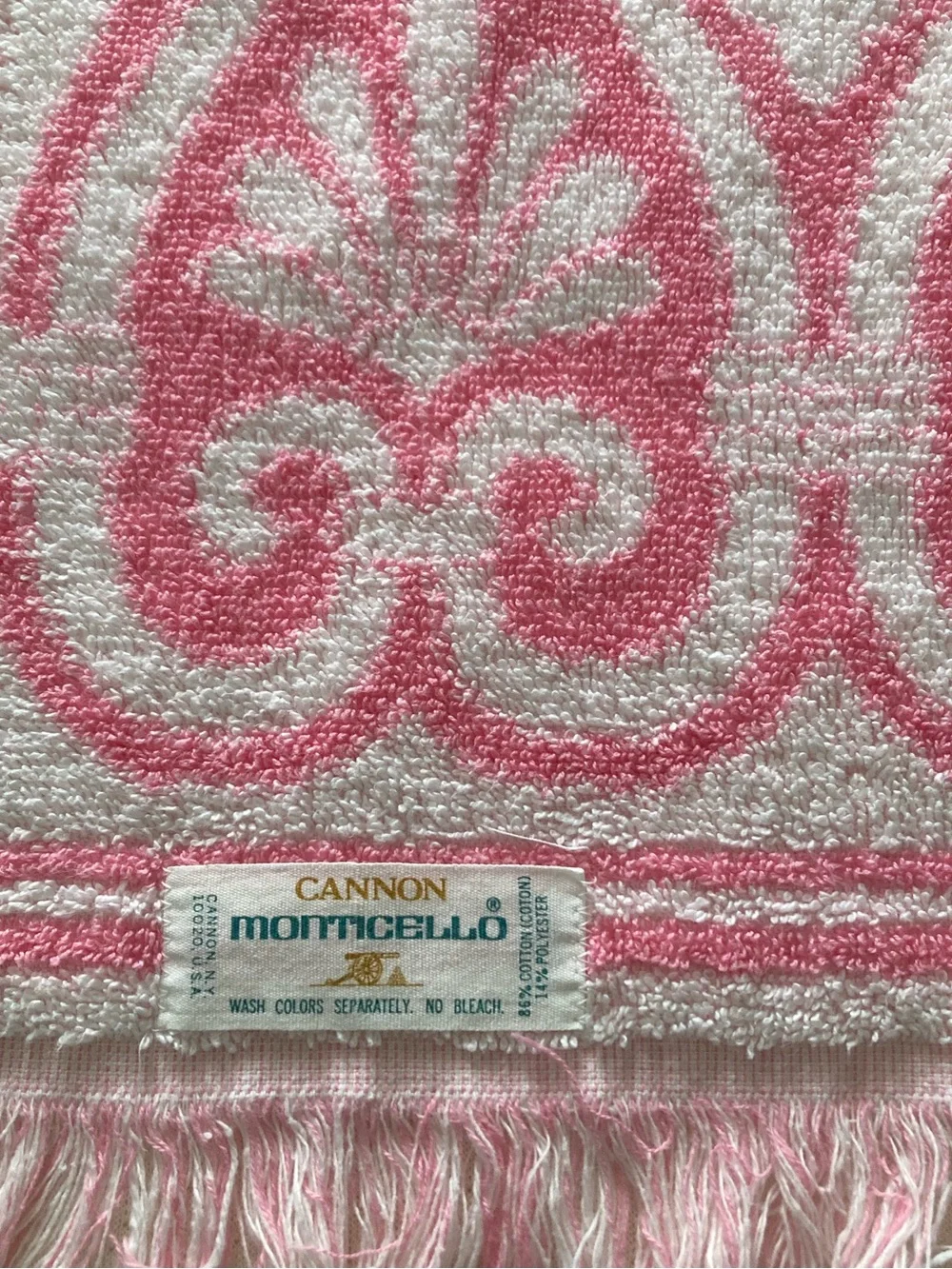 Pink and white vintage Cannon towel with fringe